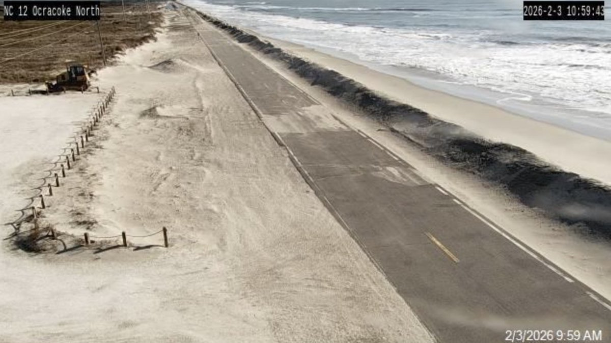 Storm surf washing across damaged NC Highway 12 on Pea Island during the September nor'easter