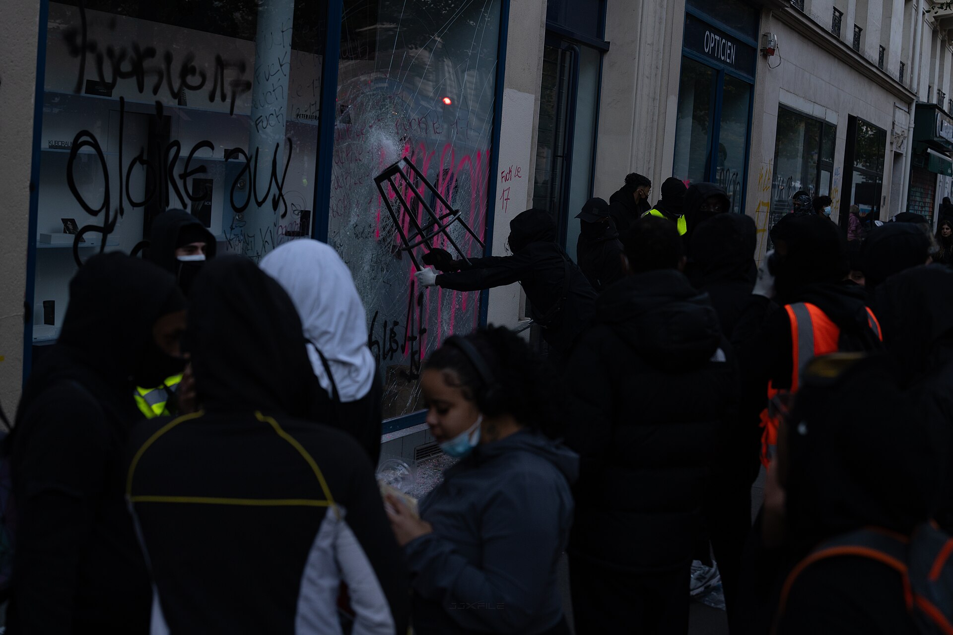A smashed and graffitied shopfront near Place de la Republique in Paris during the France Halloween protests unrest of October 17
