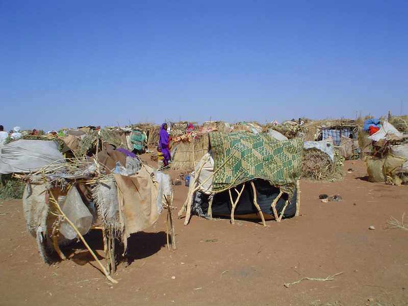 Displaced families at an IDP camp in Darfur as Sudan's civil war grinds into its fourth year