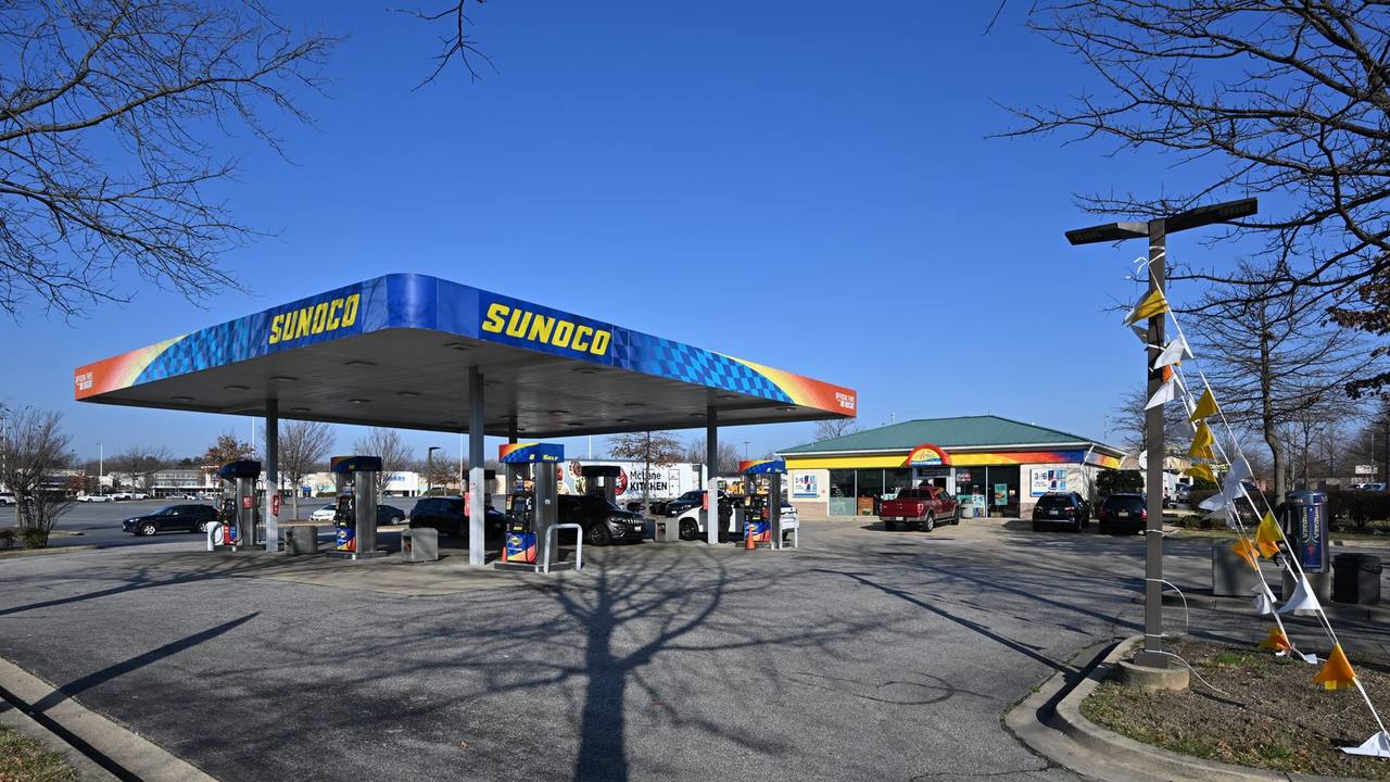A Sunoco gas station in Calverton, Maryland — fuel economy standards decide how far American cars must travel on a gallon of gasoline