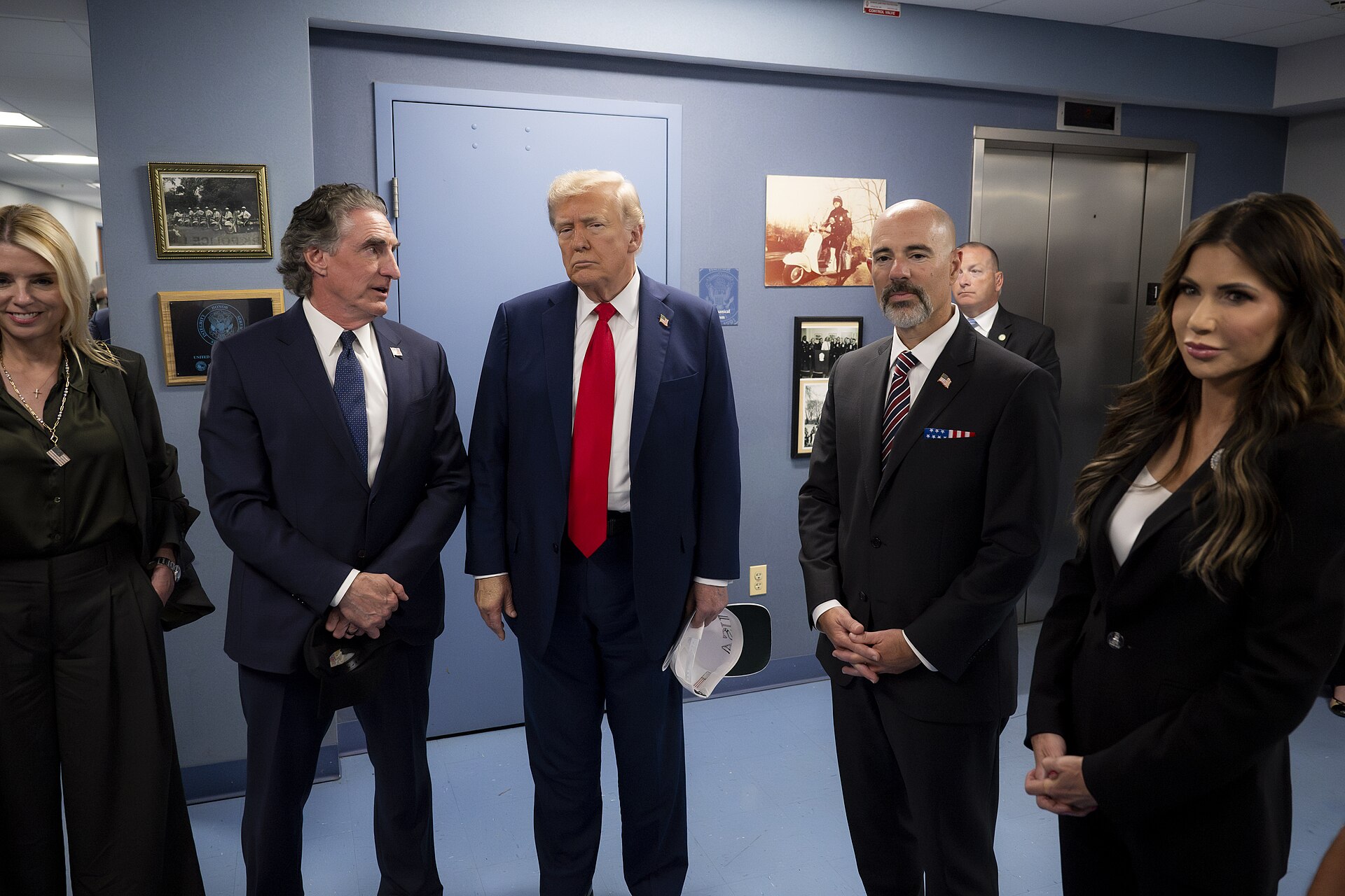 President Donald Trump with Homeland Security Secretary Kristi Noem in Washington in August 2025 — the Corey Lewandowski DOJ investigation examines contracting at Noem's DHS
