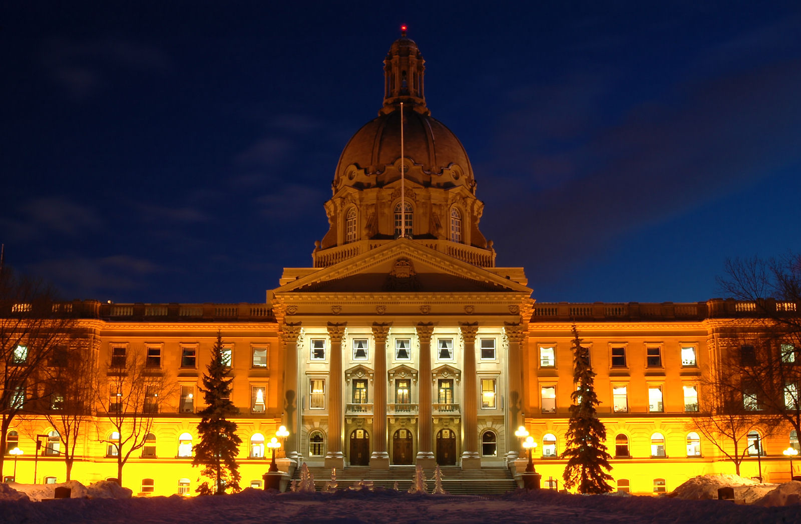 The Alberta Legislature Building in Edmonton lit at night, where the Alberta referendum results 2026 were counted after Monday's vote
