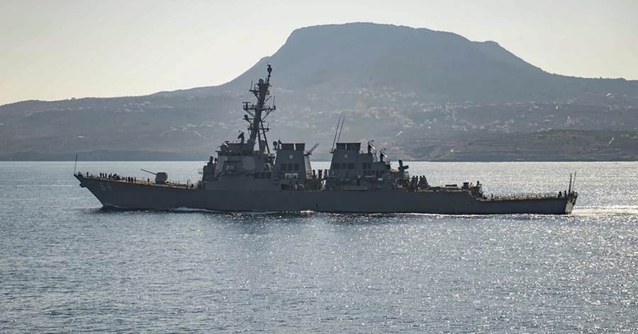 U.S. Navy destroyer transiting a strategic waterway as Saudi Arabia plans a Red Sea offensive against the Houthis