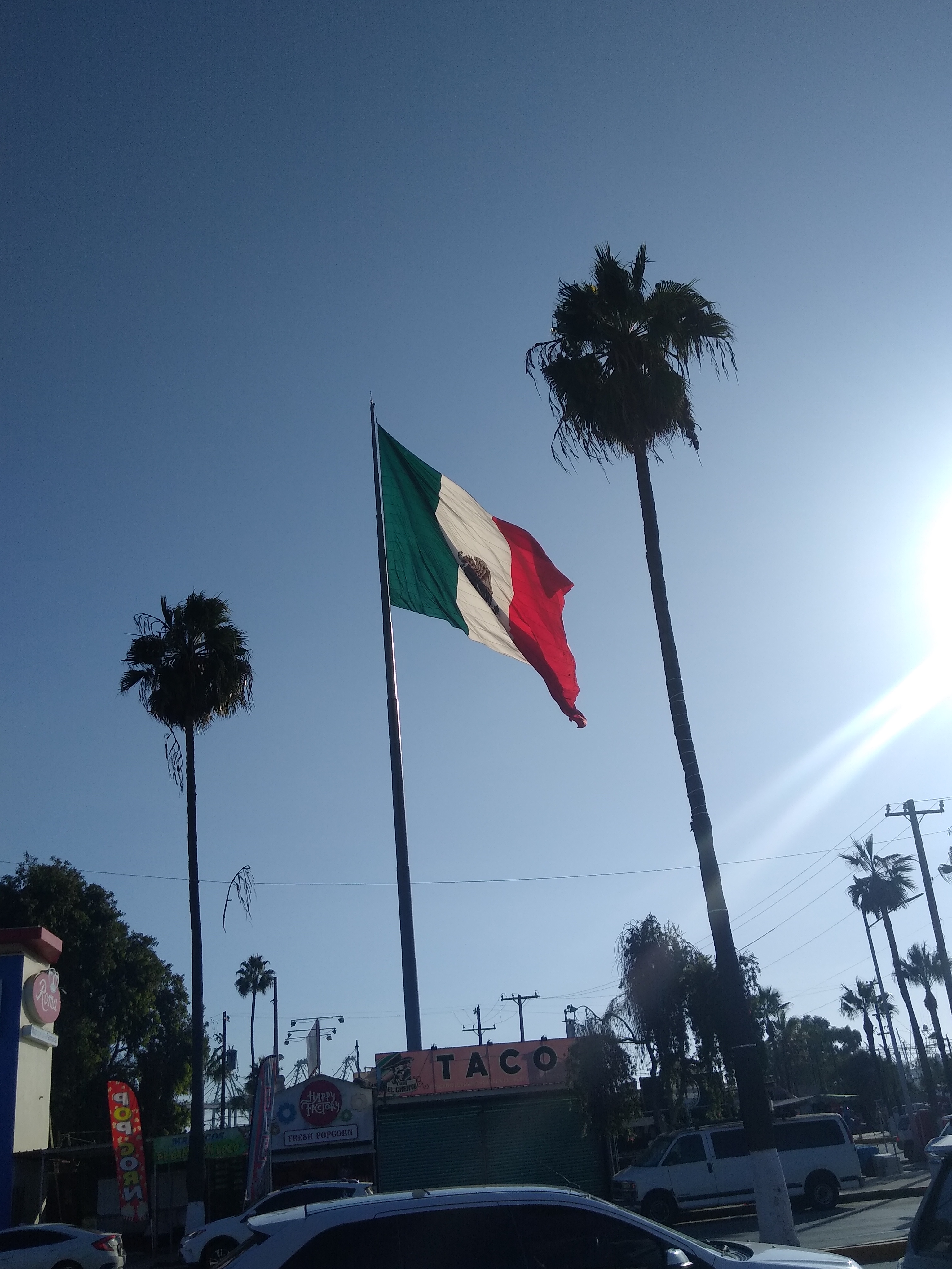 The monumental Mexican flag flying over the waterfront in Ensenada, Baja California, where the Mexico surfers murder sentencing took place