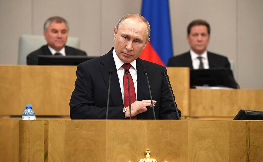 Vladimir Putin at a State Duma lectern during an archival parliamentary address, illustrating the Putin State Duma address in September 2026