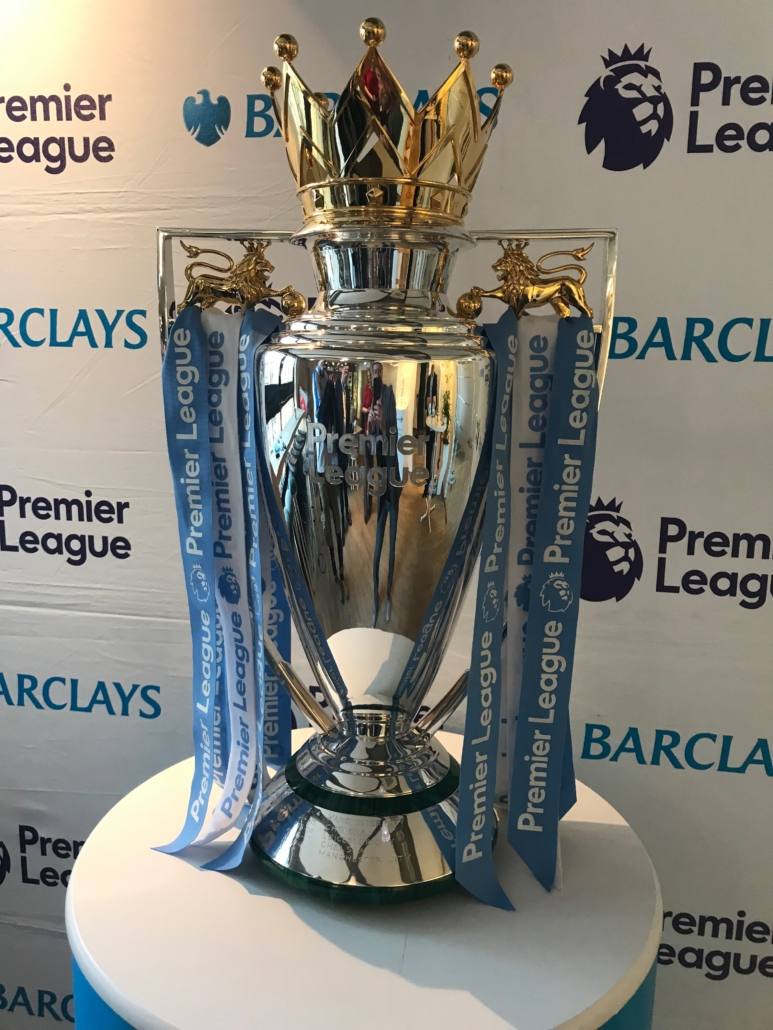 Premier League trophy illustrating the stakes of the reported Manchester City 114 of 115 charges verdict