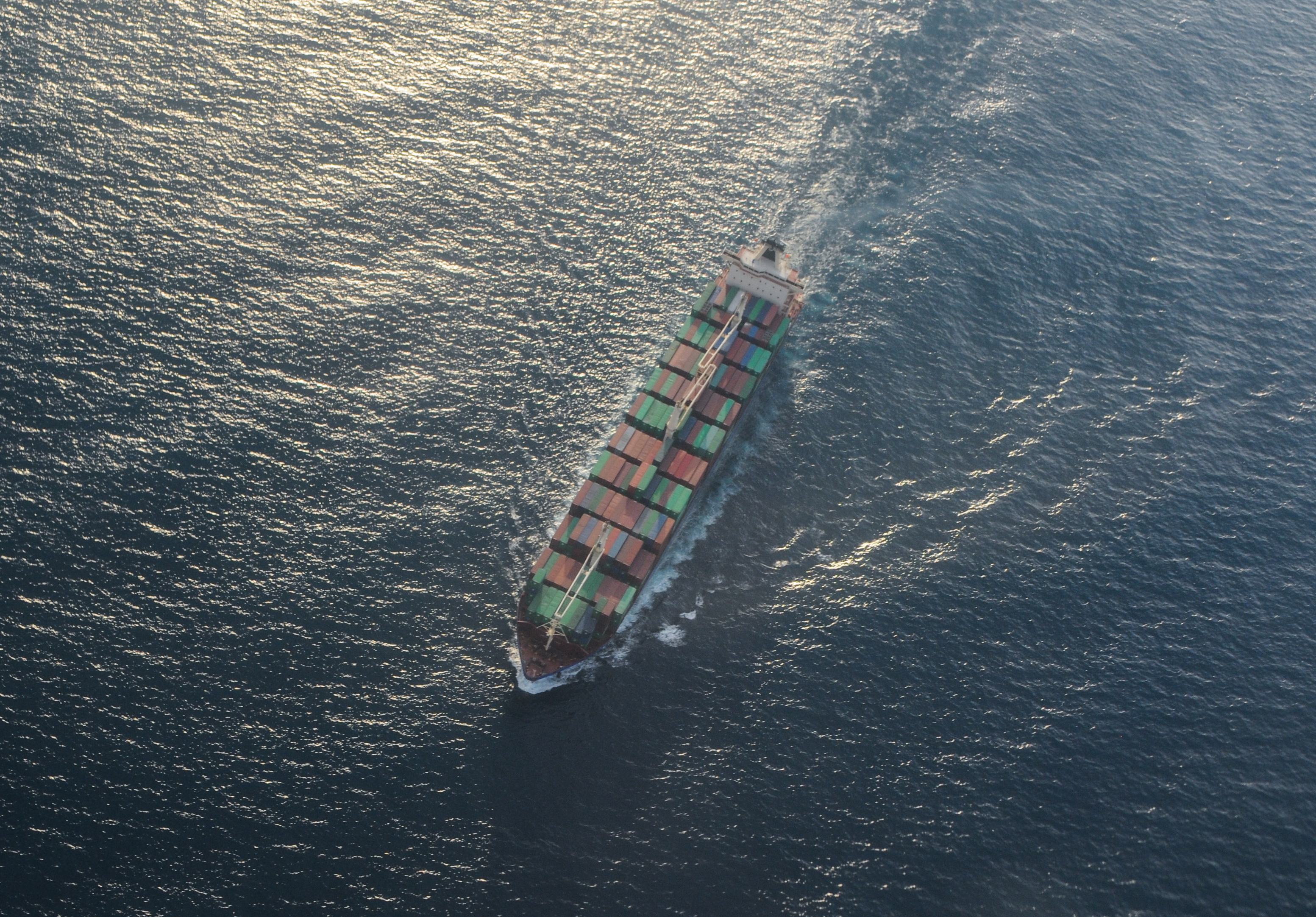 Aerial view of a loaded container ship under way at sea — container ship sunk Strait of Hormuz file photograph