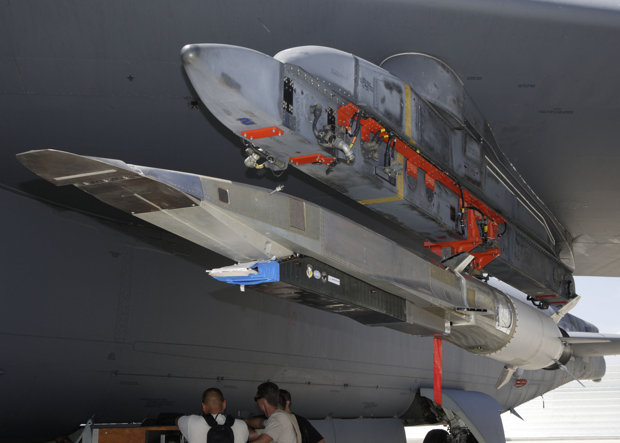 A U.S. Air Force X-51A Waverider hypersonic test vehicle mounted under the wing of a B-52 bomber in 2009 — file photo