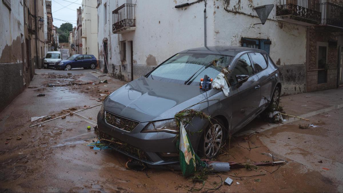 Mud and flood debris around a car after southern Catalonia flooding in October 2025