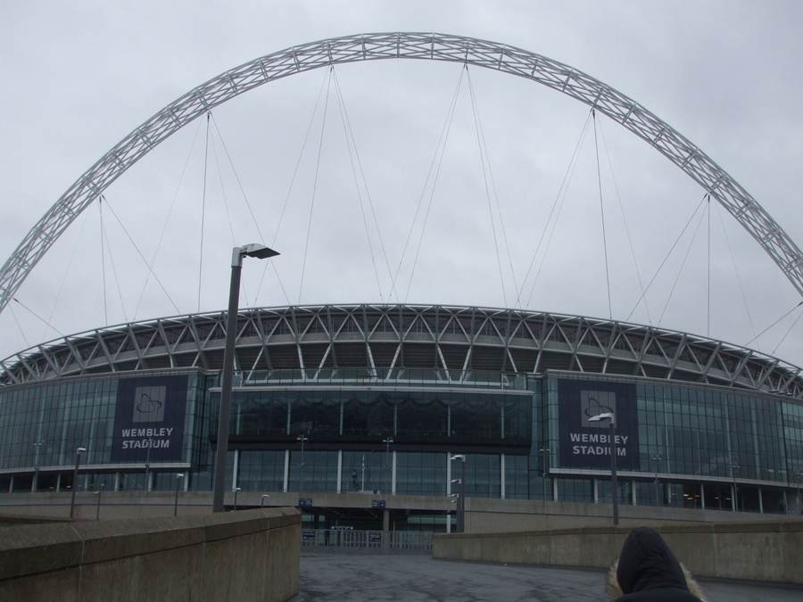 Wembley Stadium under floodlights, shown as a contextual image for England versus Spain