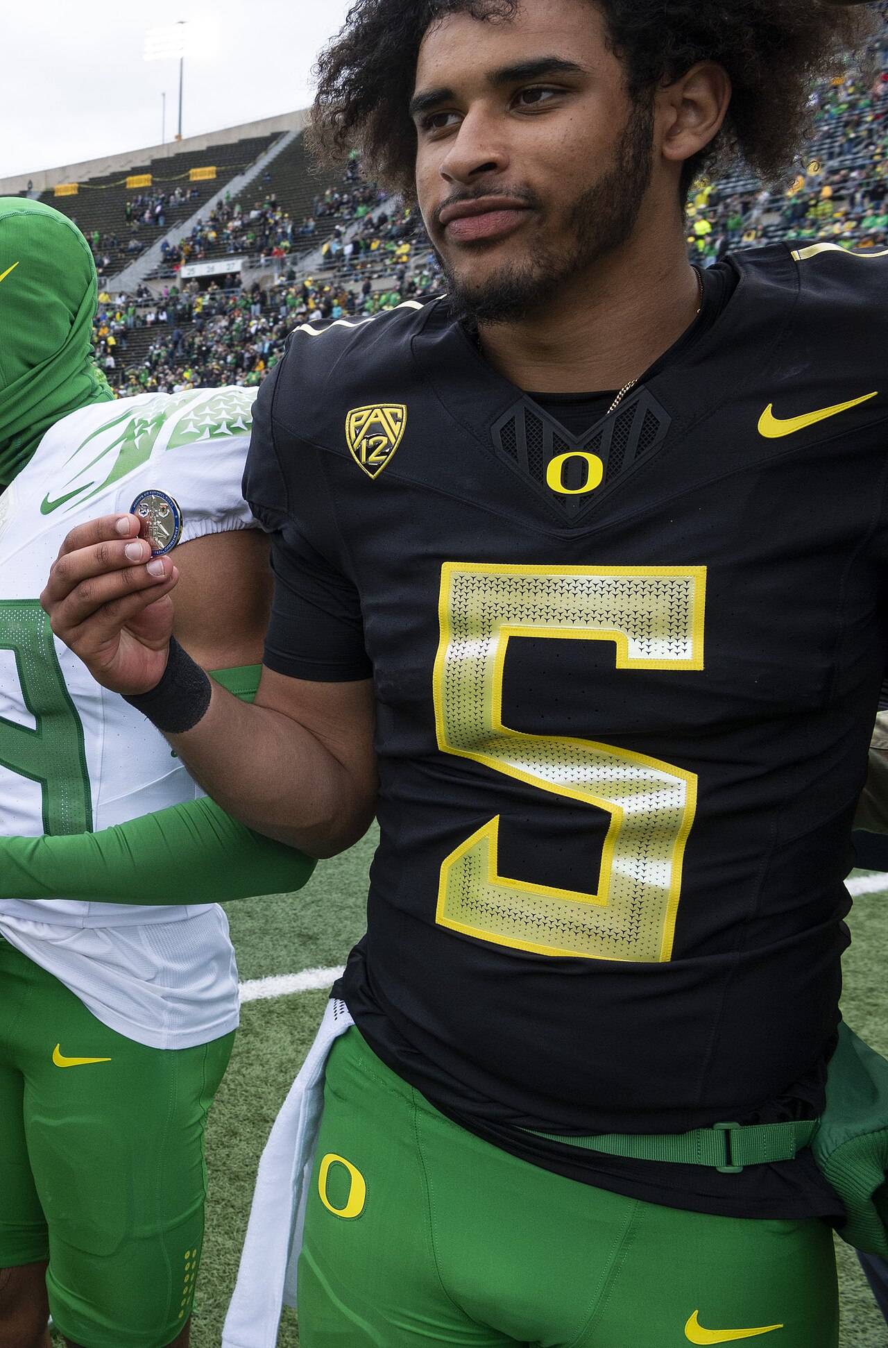 Oregon quarterback Dante Moore in his No. 5 jersey at a spring game — the Dante Moore injury update ends his 2026 season