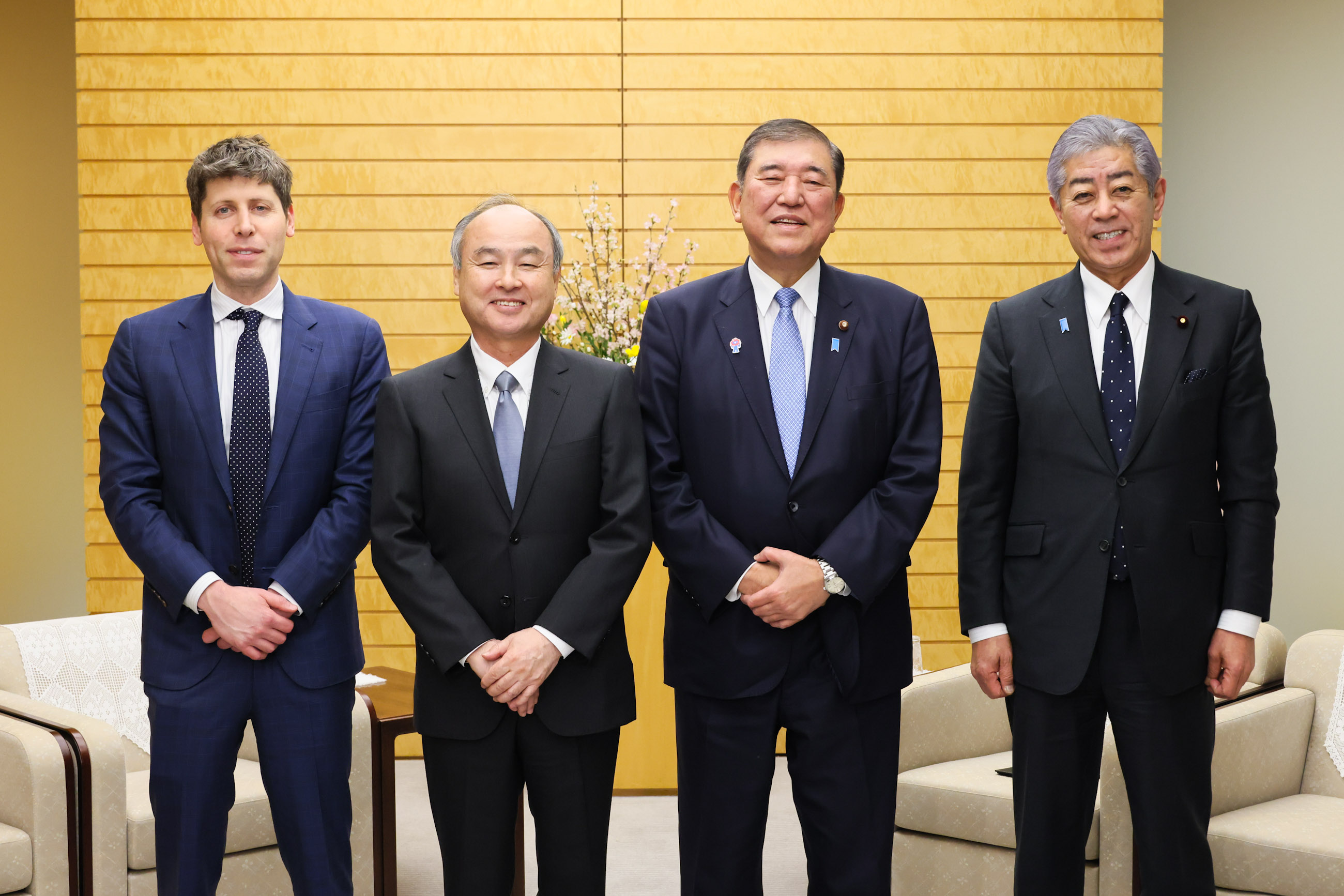 OpenAI CEO Sam Altman meeting SoftBank's Masayoshi Son in Tokyo in February 2025 as OpenAI funding target cut talks reshape the AI race