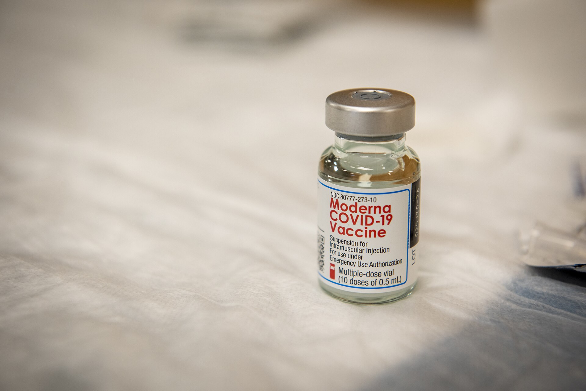 A Moderna vaccine being administered — Moderna cancer vaccine data selloff after detailed Phase 3 intismeran melanoma results