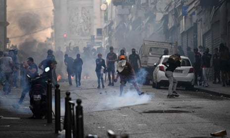 Riot police face off with youths in Marseille during France's student riots