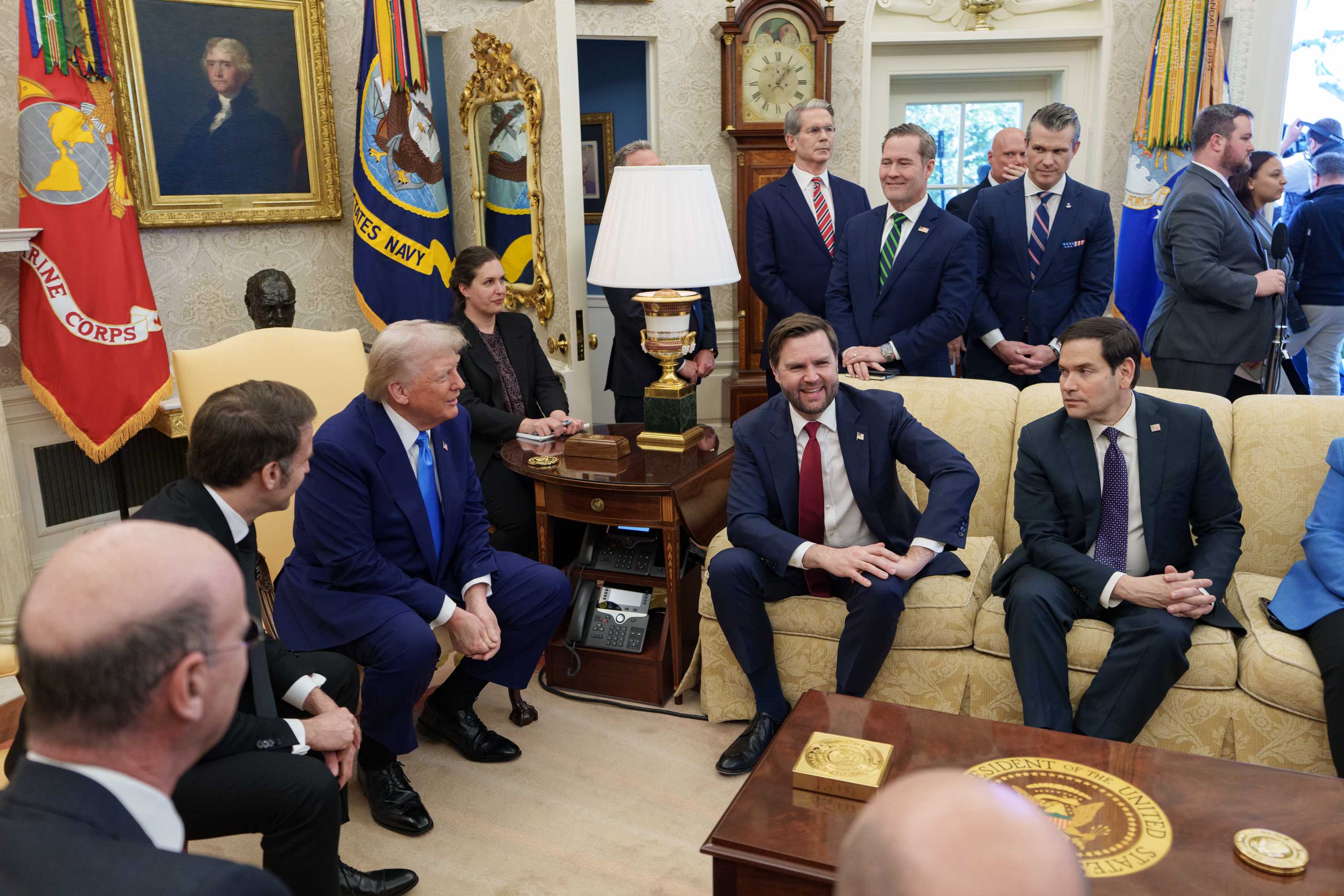 President Donald Trump meets French President Emmanuel Macron, who convened the emergency G7 energy meeting
