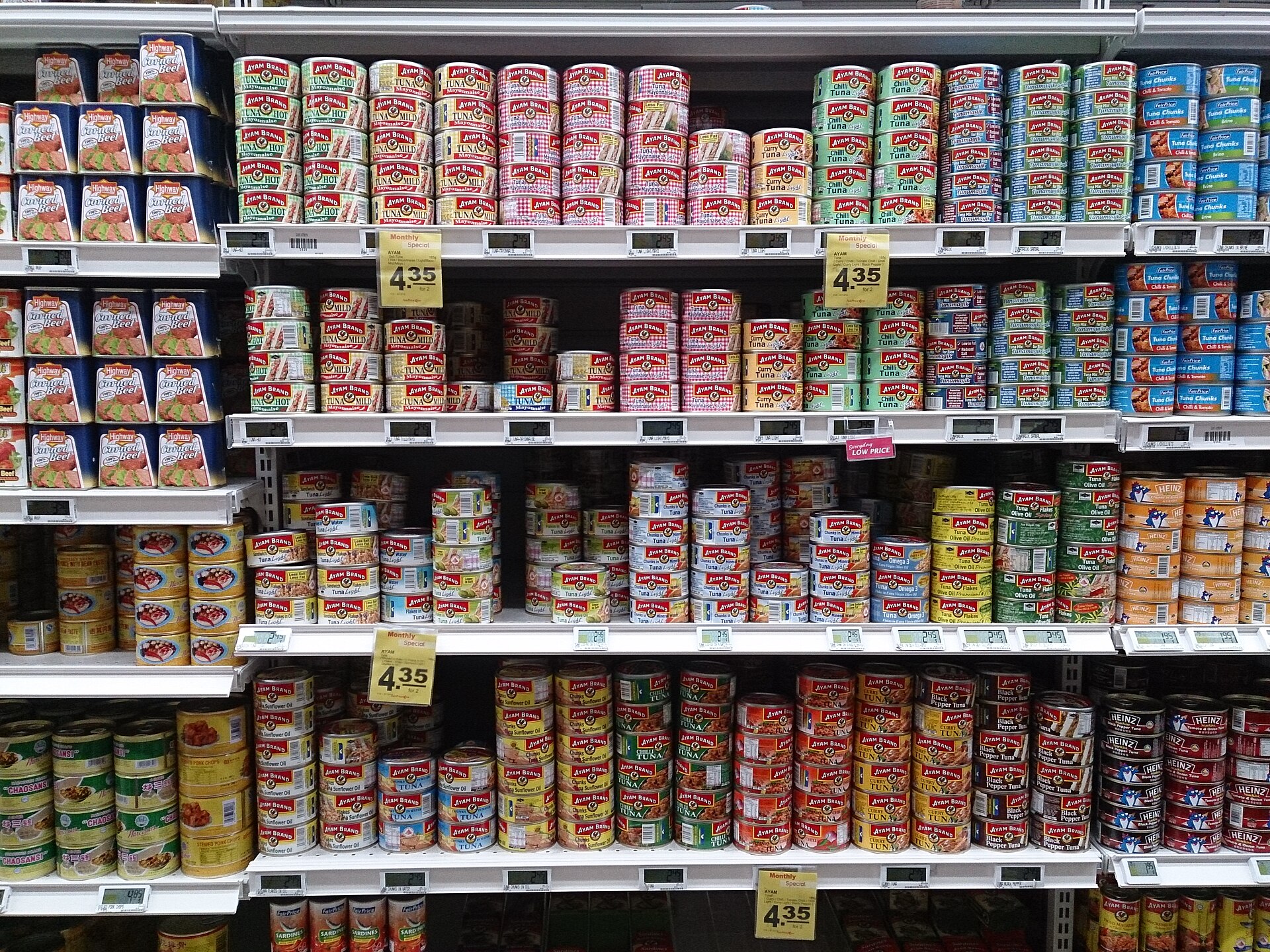 Supermarket shelves stacked with tinned food, as UK stockpile sales surge after the Be Ready campaign told households to keep three days of supplies