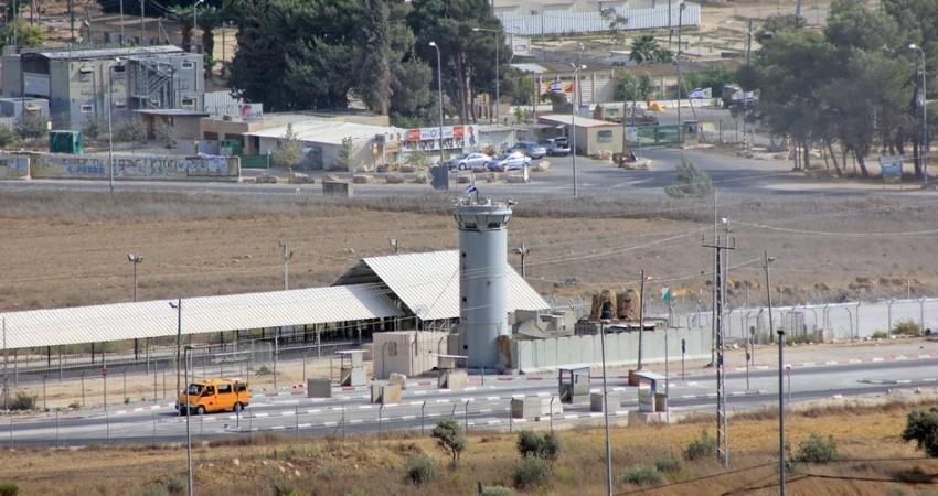 Israeli checkpoint in the West Bank with tower and road barriers in a 2021 file photograph