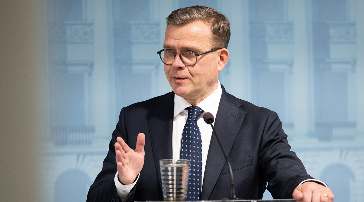 Finnish Prime Minister Petteri Orpo speaking at a government press conference in Helsinki