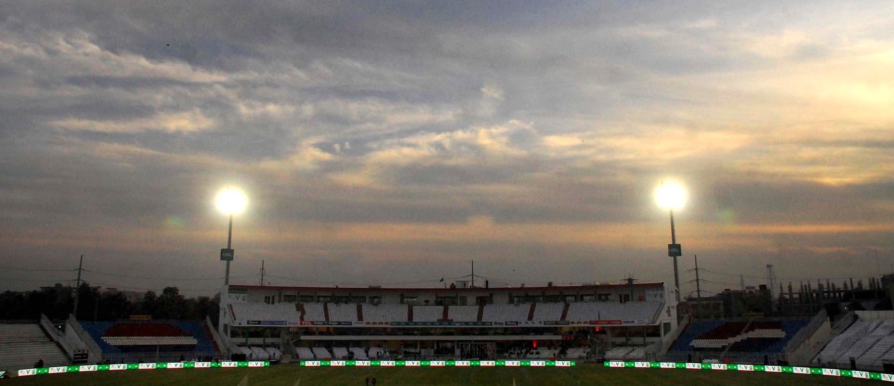 Rawalpindi Cricket Stadium under floodlights at dusk — where Harry Brook scored 202 and England made 429 for 4, the highest ODI total in Pakistan