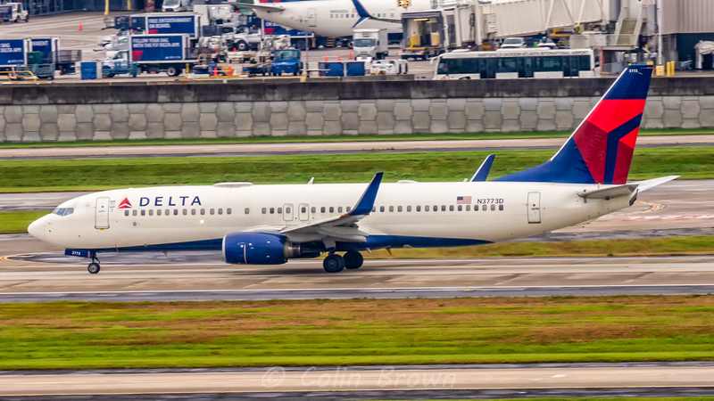 Delta Boeing 737 at Atlanta airport as the airline cuts full-year earnings guidance