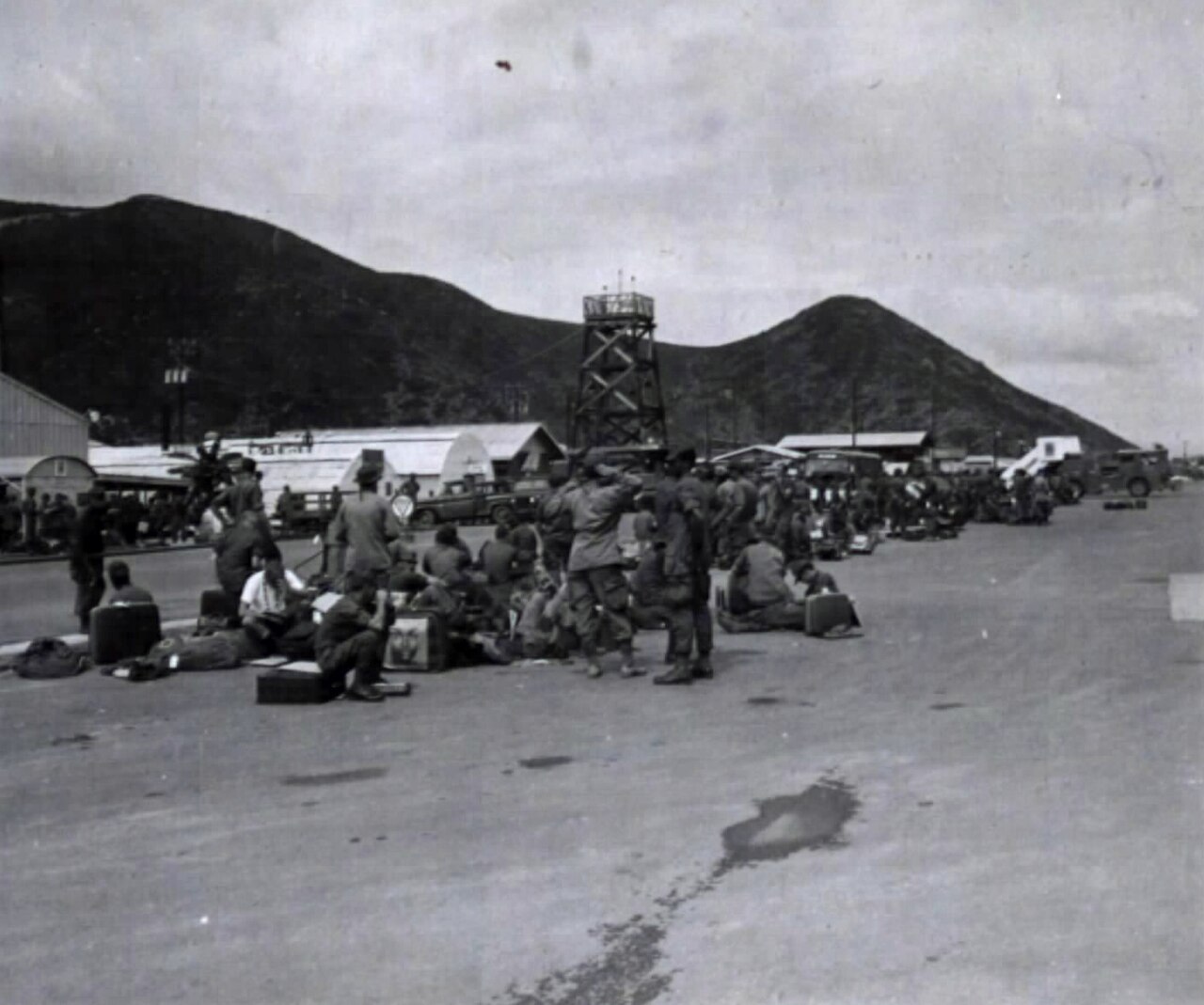 4th Infantry Division soldiers waiting with their bags at Qui Nhon Army Airfield in Vietnam, a file photo of the division William Reaves joined in 1969