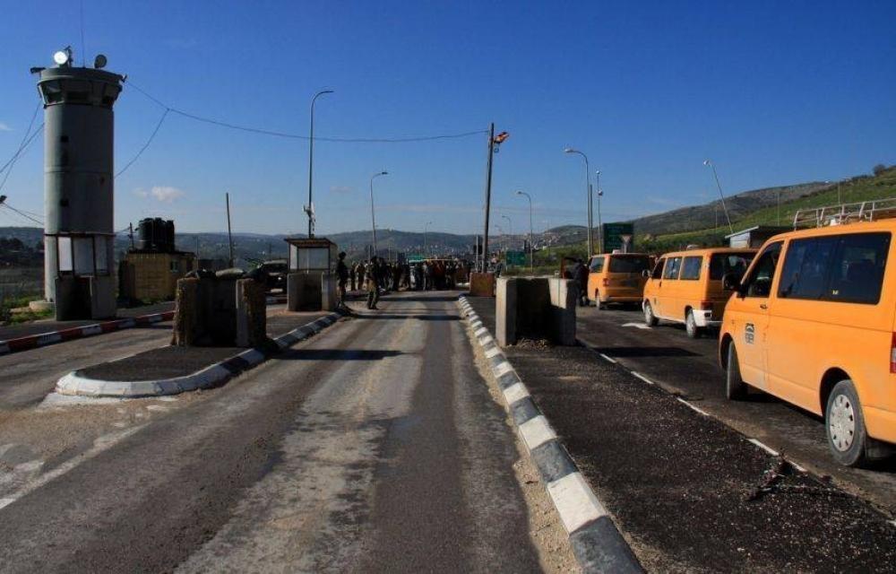 West Bank checkpoint with a watchtower and vehicle barriers in a 2020 file photograph