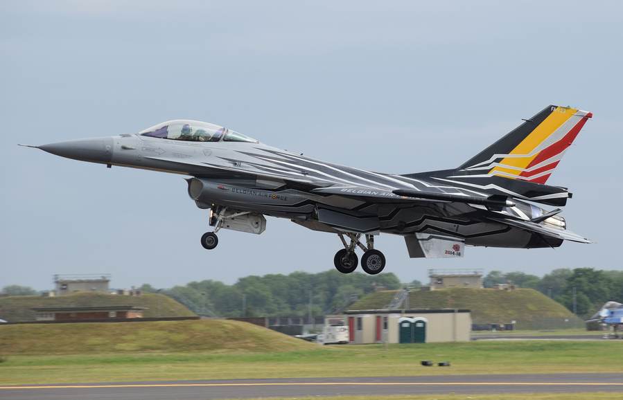 Belgian Air Component F-16AM arriving at RAF Fairford, illustrating Belgium's F-16 transfer to Ukraine