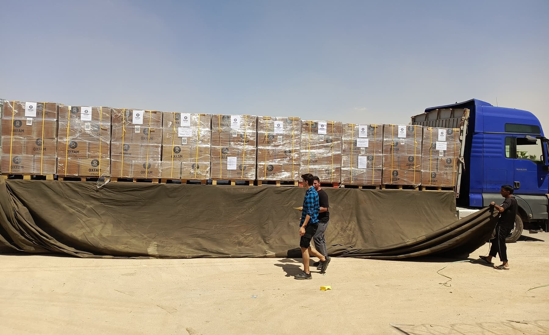 Oxfam humanitarian aid truck carrying supplies for Gaza as aid targets remain disputed