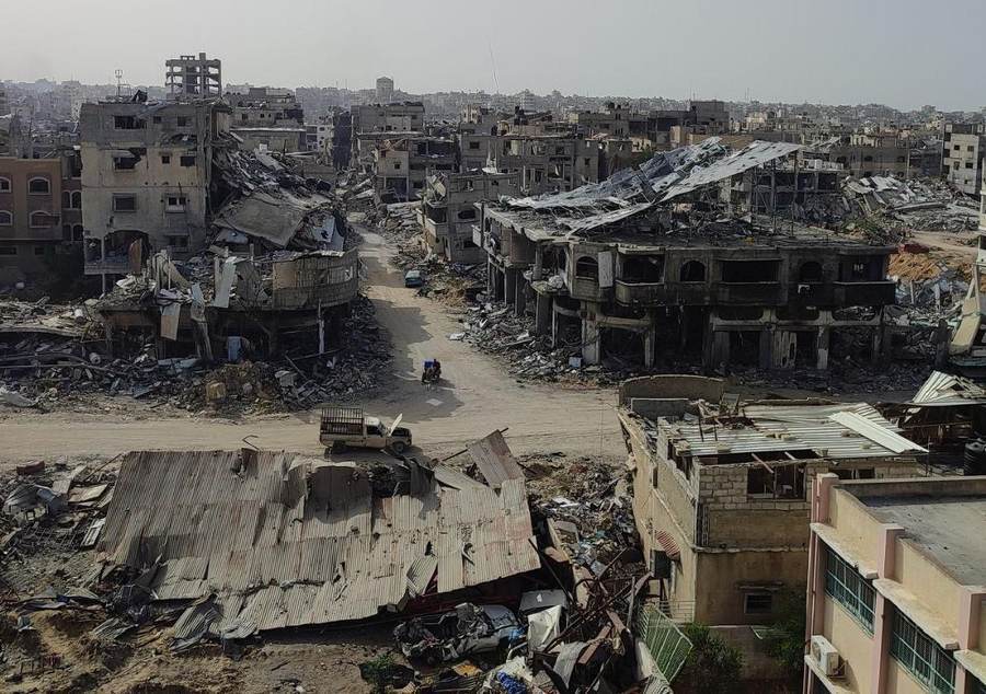 Destroyed street in Khan Younis, Gaza, illustrating coverage after Israel said a Hamas finance chief was killed