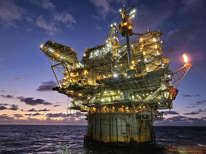 Gulf offshore oil platform illustrating oil prices surge Iran fears and Hurricane Isaias production risk