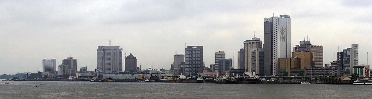 Lagos skyline and marina illustrating the Nigeria rate cut as Egypt holds policy rates