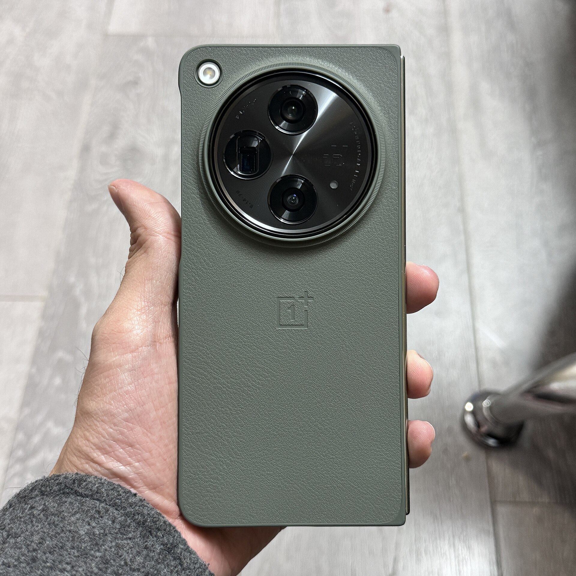 A book-style foldable smartphone opened flat — file photo illustrating the foldable form factor behind the iPhone Duo sold out preorders story