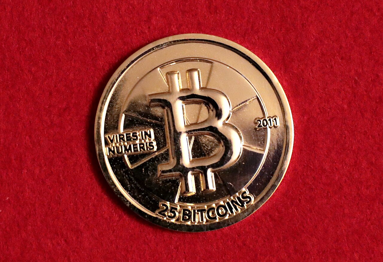 A physical 25 bitcoin Casascius novelty coin representing cryptocurrency