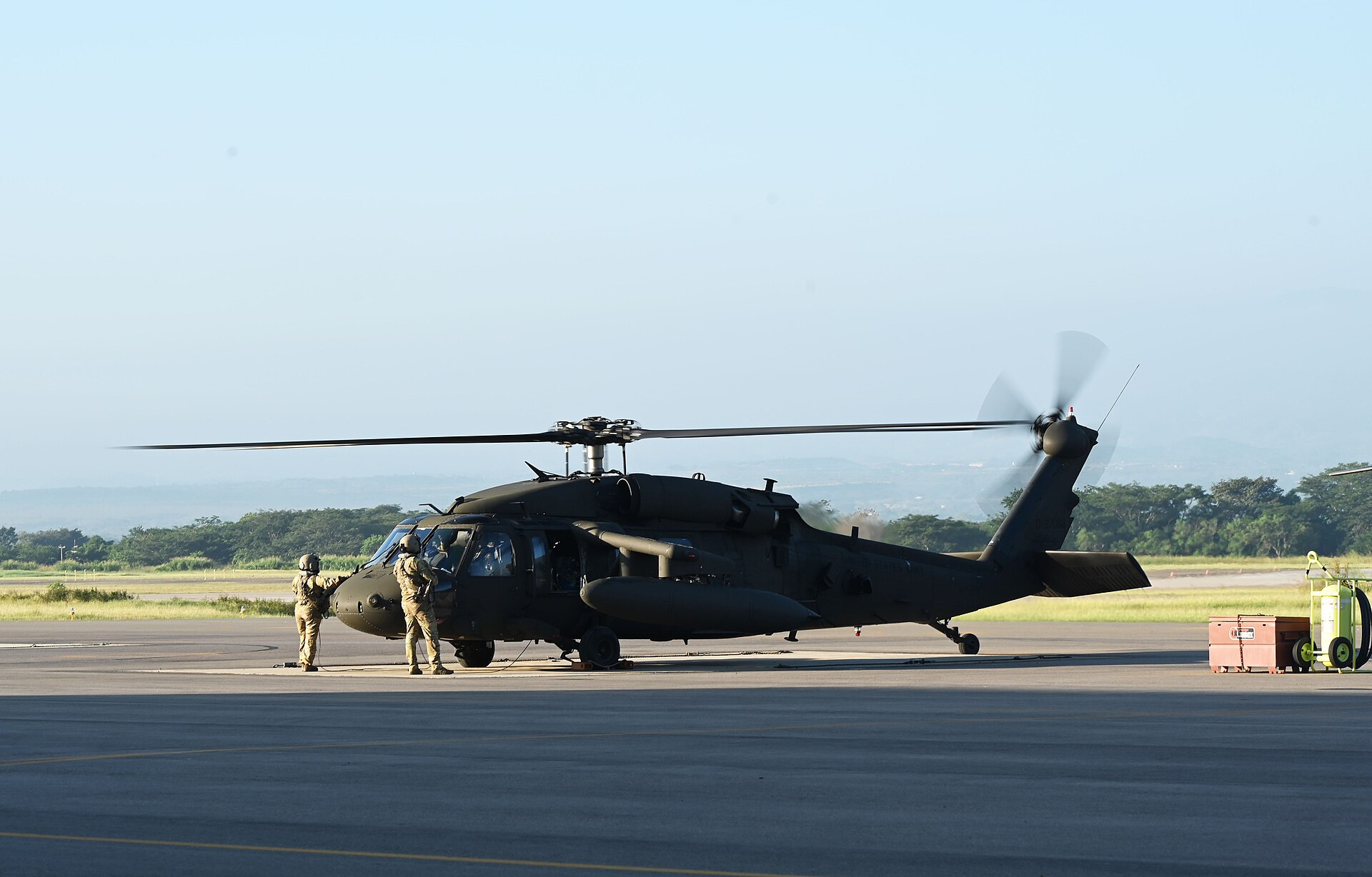 A U.S. Army UH-60 Black Hawk helicopter preparing to depart Soto Cano Air Base, Honduras