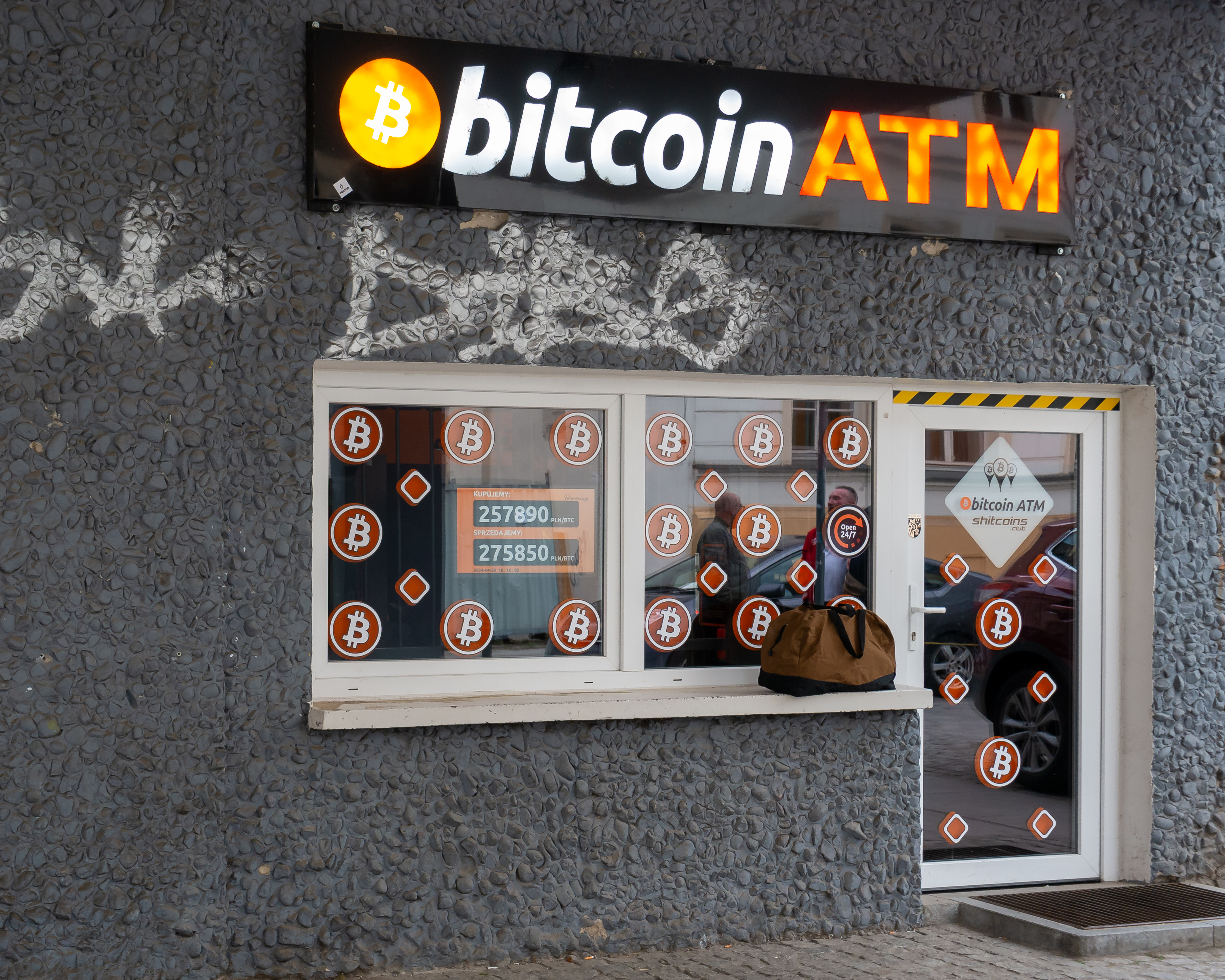 Bitcoin signage at a store in Wrocław, Poland, as the Bitcoin price in October 2026 extends a third straight weekly gain