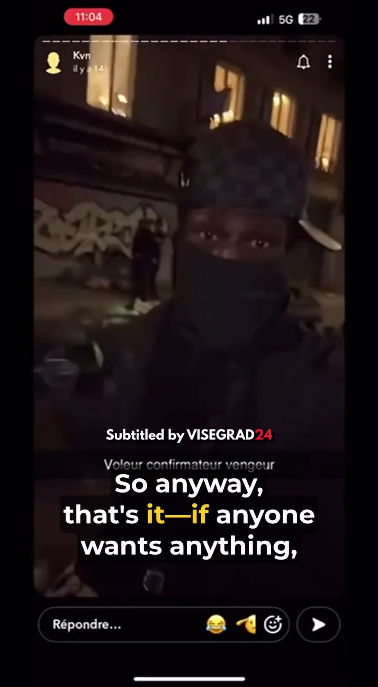 The masked man filming himself in front of a graffiti-covered wall in the France looter Snapchat video