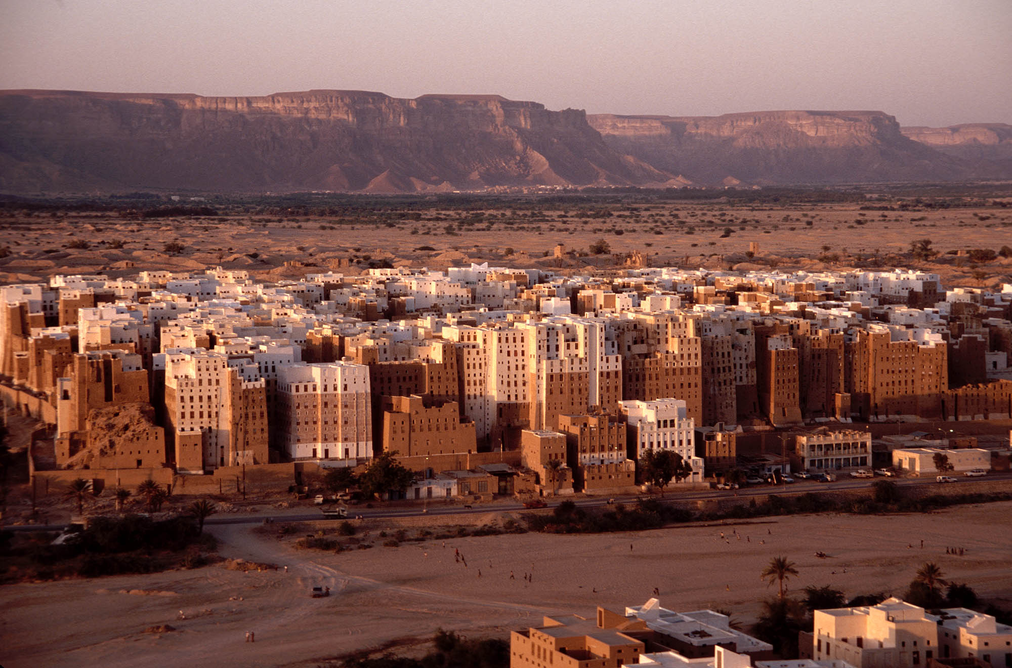 The mudbrick tower houses of Shibam in Wadi Hadhramaut, Yemen — Al Rayyan airport strike in Mukalla, Hadramout