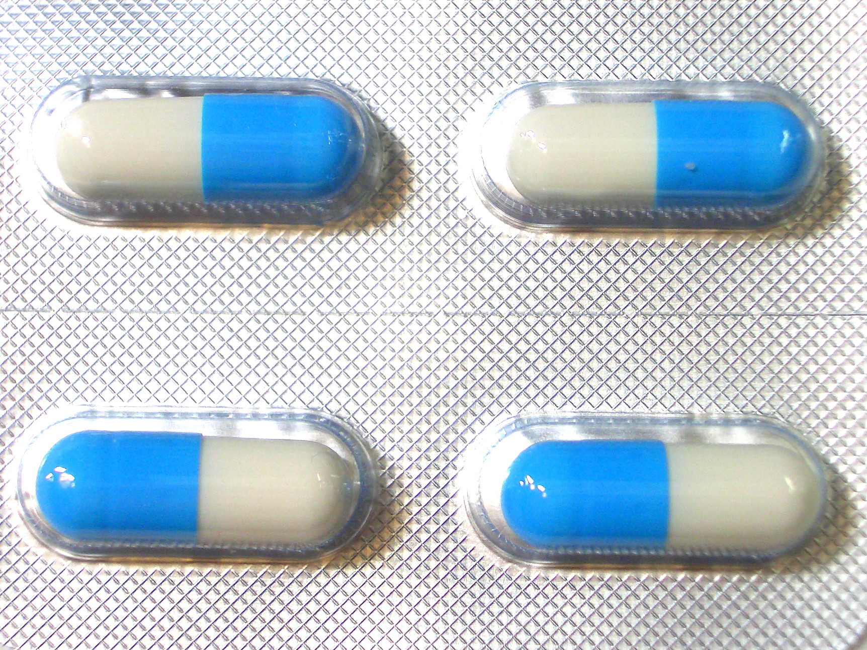 Antibiotic capsules representing doxycycline and other plague treatment drugs
