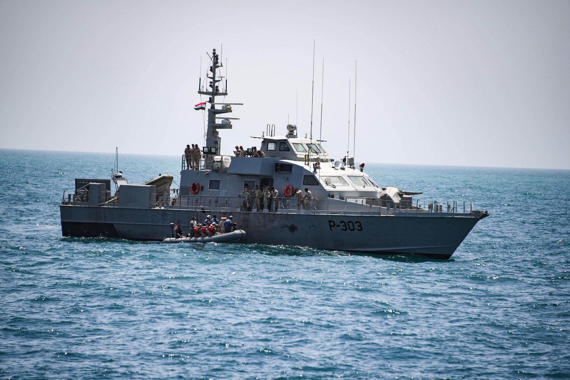 A U.S. Navy small boat from the coastal patrol ship USS Chinook alongside the Iraqi navy patrol boat P-303 during an exercise in the Arabian Gulf, archive photo