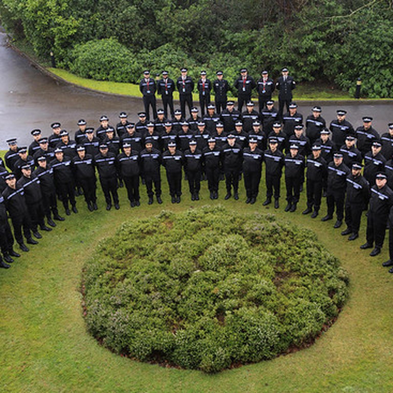 Greater Manchester Police officers arranged for a group photograph in a file image