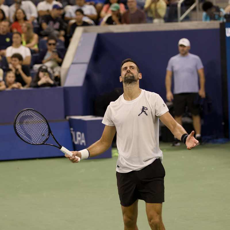 Novak Djokovic practicing at the 2026 US Open before his first-round exit and Beijing resurgence
