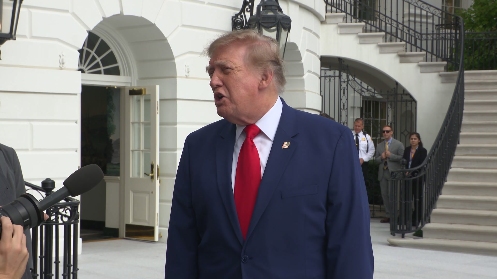 President Donald Trump speaks to reporters on the White House South Lawn before departing for Georgia — Trump denies Starlink Ukraine cut remarks