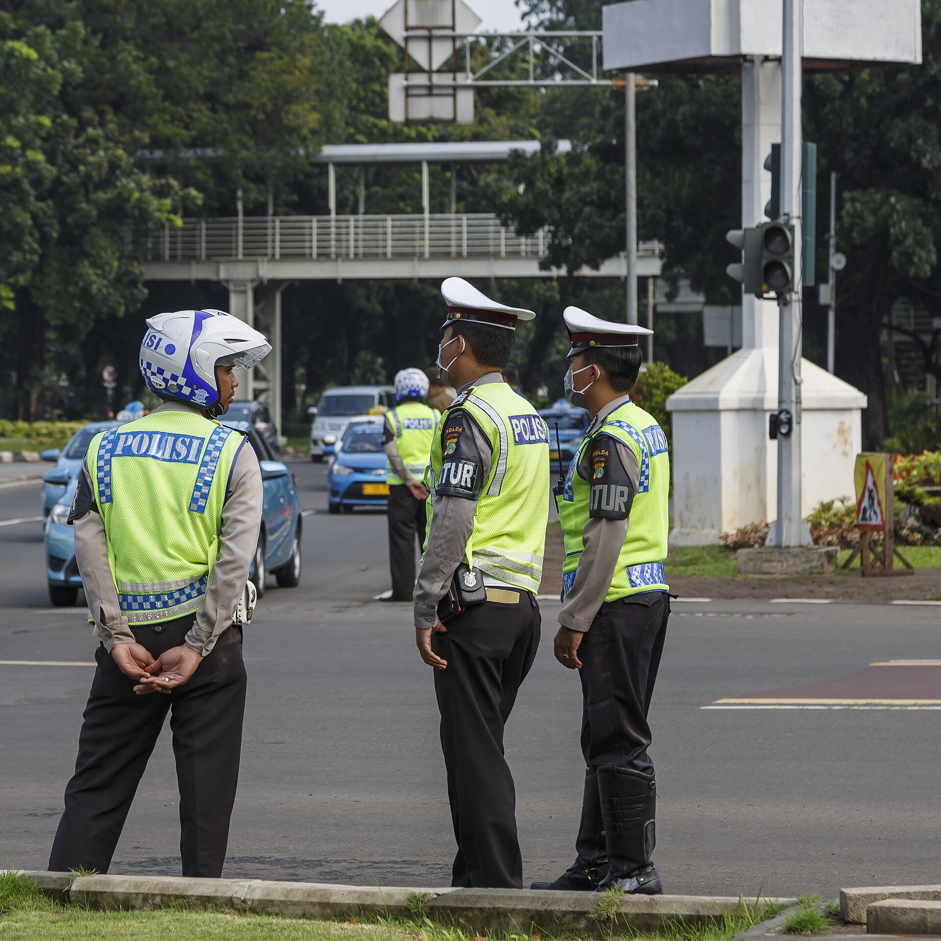 Indonesian police officers in POLISI vests on duty in Jakarta — national police chief Suyudi Ario Seto announced the ketamine seizure on Friday