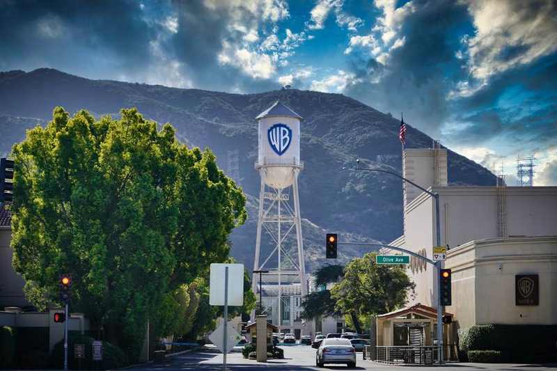Warner Bros. Burbank studio entrance and water tower as the Paramount Warner Bros Skydance rebrand approaches
