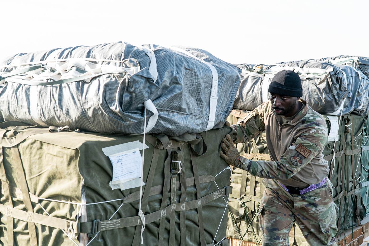 Airmen load pallets of humanitarian aid bound for Gaza