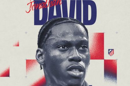 Jonathan David competing in a football match for Atlético Madrid