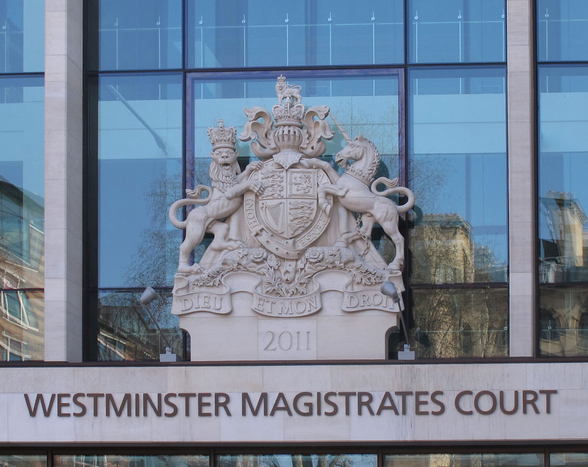 The royal coat of arms at Westminster Magistrates' Court in London, where the two men charged in the RAF Fairford case were due to appear