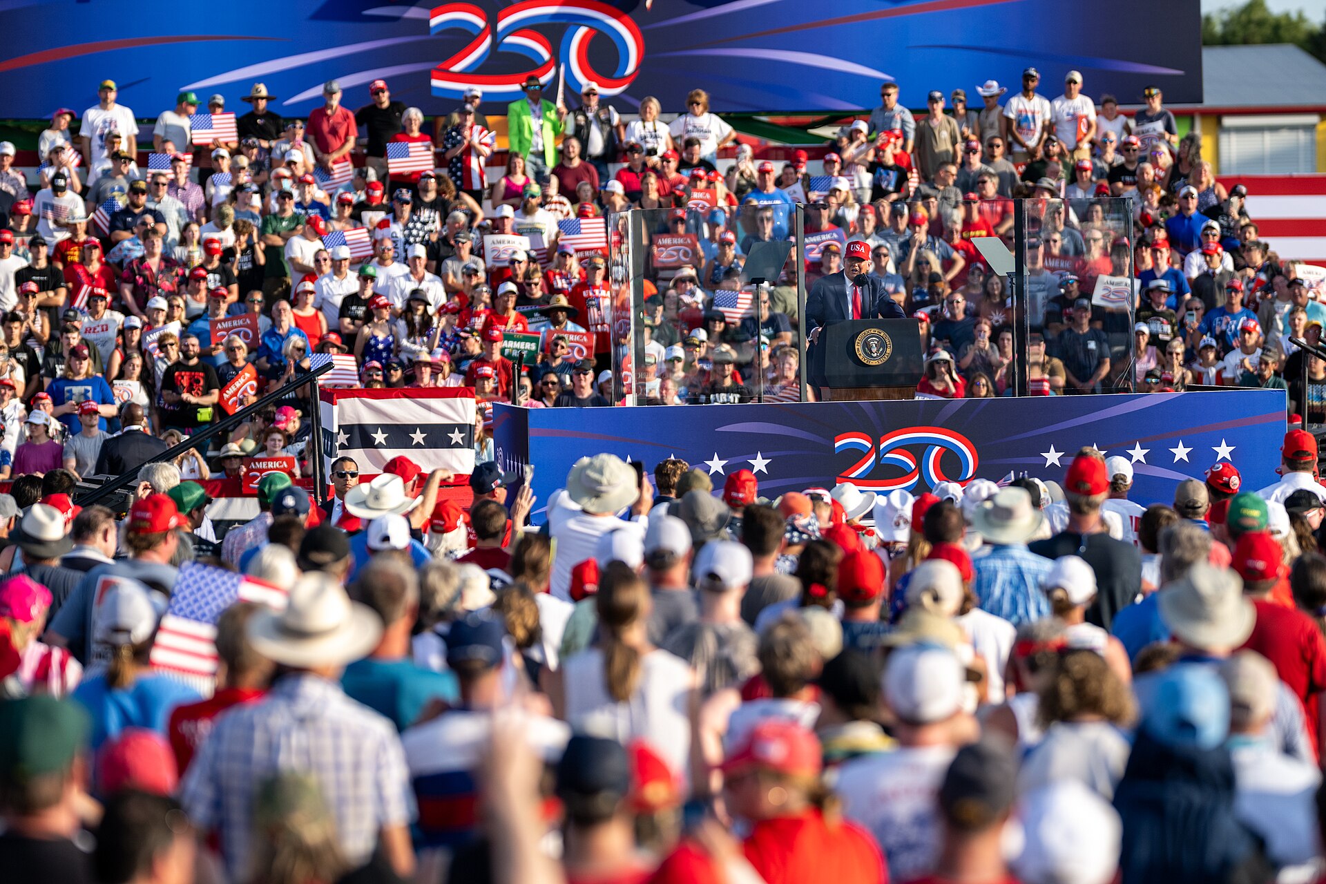 President Donald Trump speaking at a lectern before a large crowd in Des Moines, Iowa, in July 2025 — file photo for the Trump Sioux City rally story