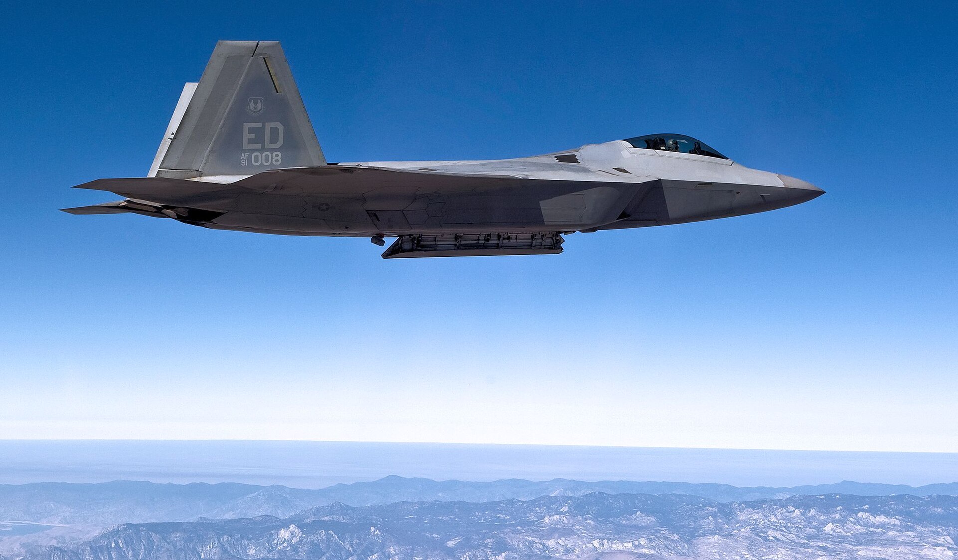 F-22 Raptor test jet — the F-22 is the Air Force threshold platform for controlling Collaborative Combat Aircraft