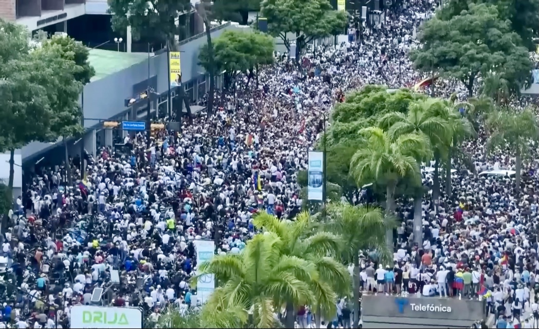 Venezuela protest demands elections — a mass opposition crowd fills a Caracas avenue in a file photo from the 2024 post-election protests